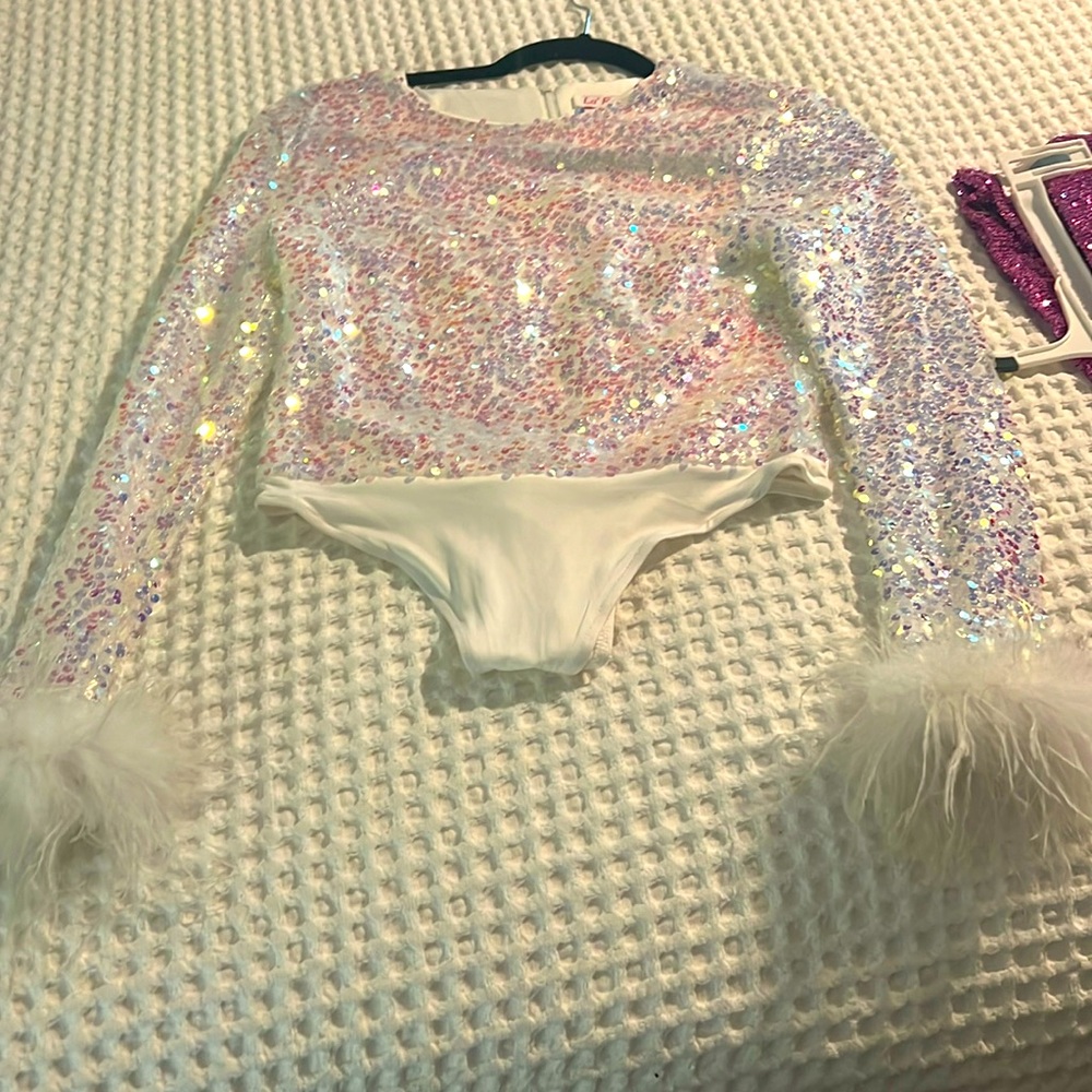 Irridescient sequin body‎ suit with fur on sleeves